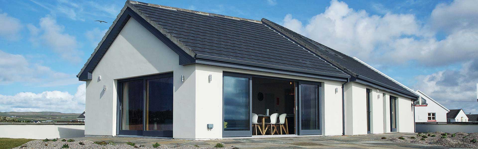 Renovated single-storey house in Liscannor, County Clare with large sliding glass doors